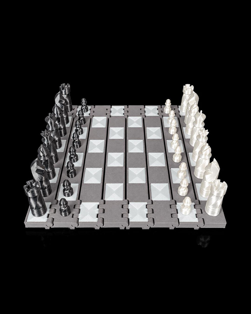 3D printed castle chess pieces set up on the Checkmate Keep board