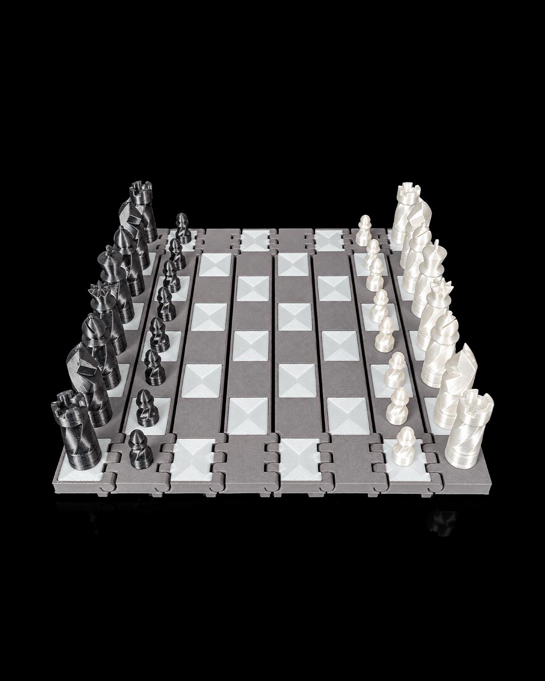 3D printed castle chess pieces set up on the Checkmate Keep board
