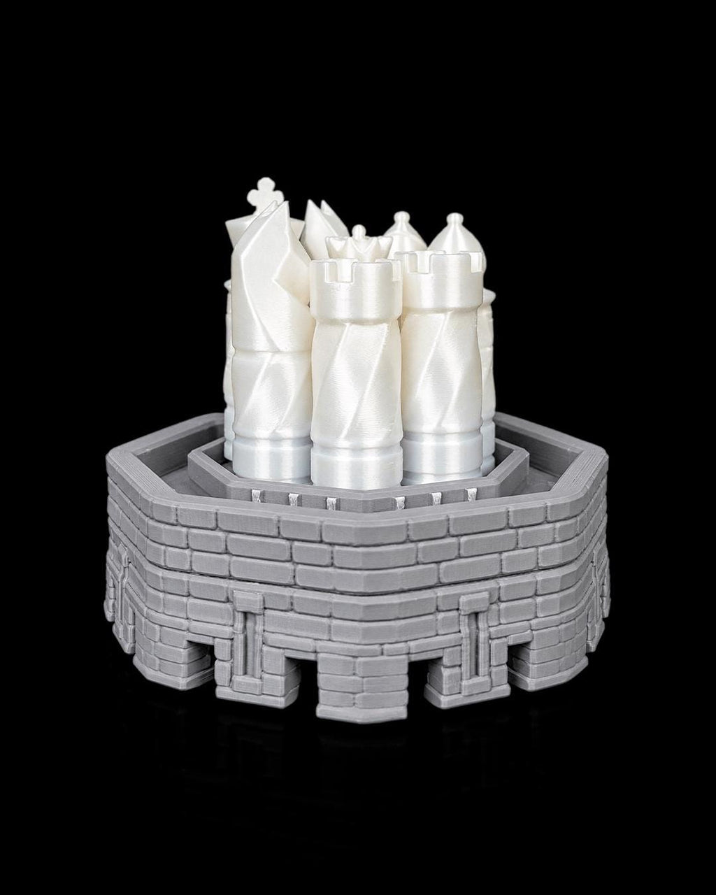 Checkmate Keep castle tower chess set displayed on a shelf