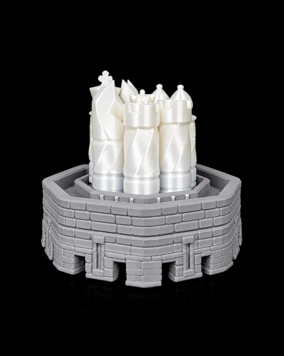 Checkmate Keep castle tower chess set displayed on a shelf