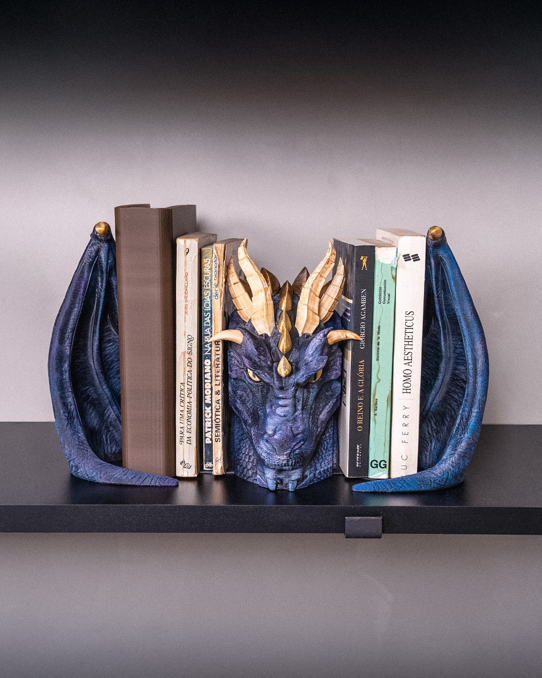Dragonbound dragon bookends displayed on bookshelf with books