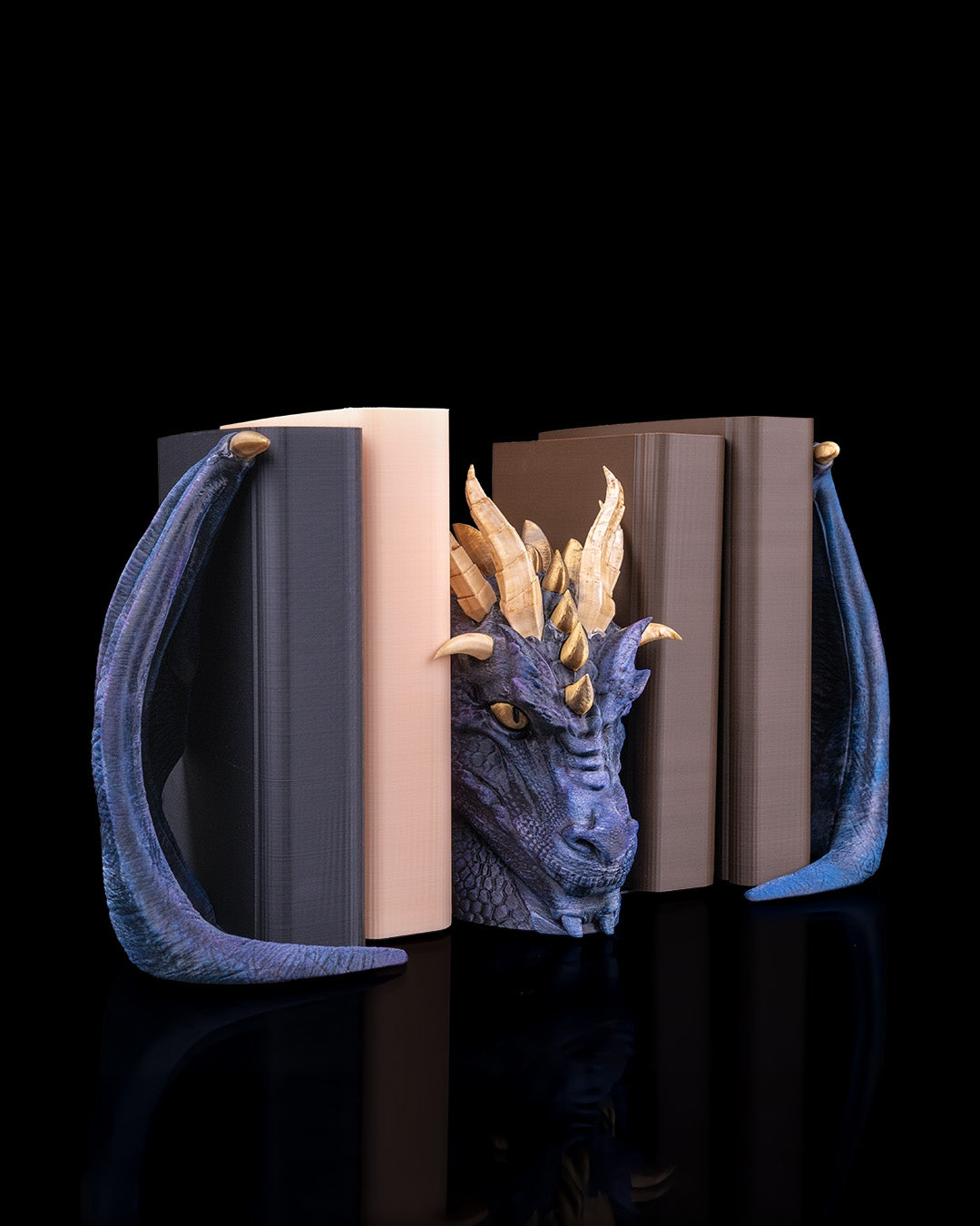 Dragonbound dragon bookends holding books angled view