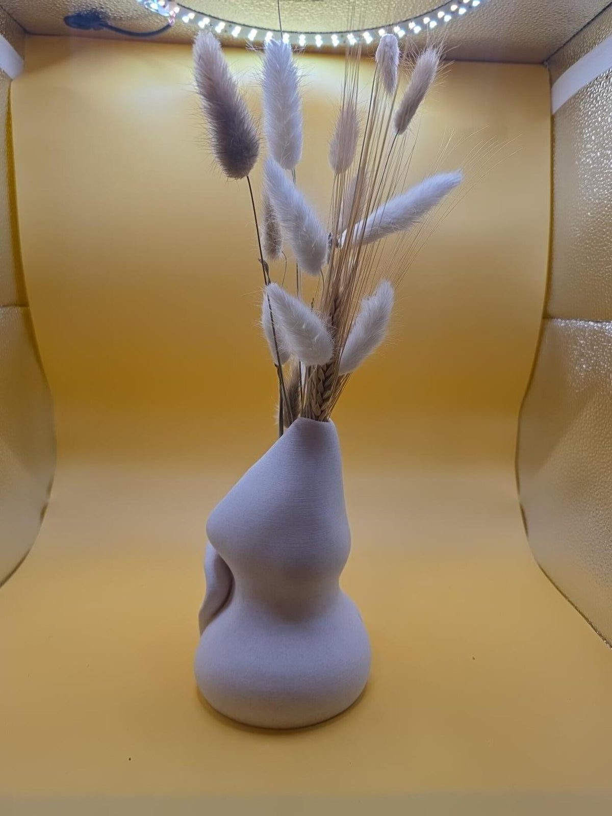 Light gray Embrace vase, three-quarter view