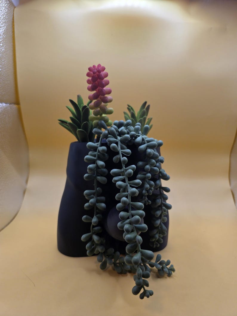 Black Good Morning Wood planter with plants, side view