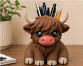 Brown Hamish the Highland Cow desk buddy holding pens and pencils