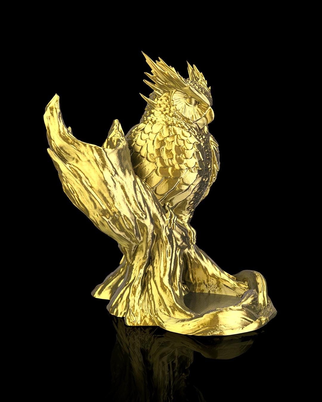 The Omen Owl dice tower in gold, angled side view