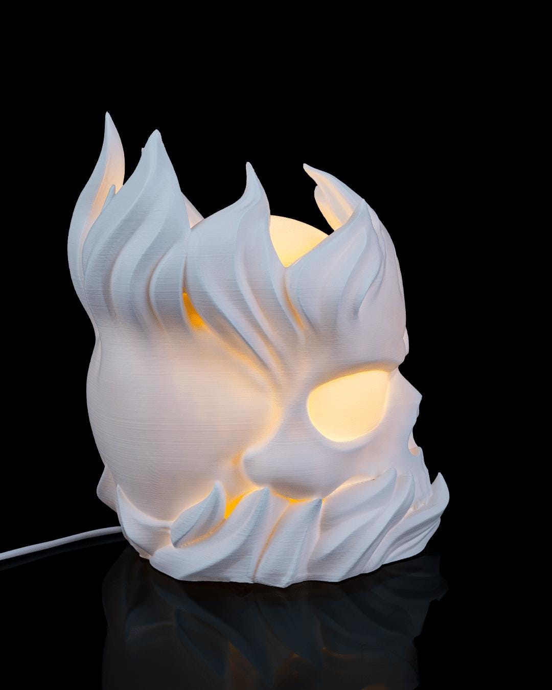Skull sphere lamp lit, angled side view