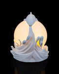 Twin fish sphere lamp lit, front view with two fish rising beside the orb