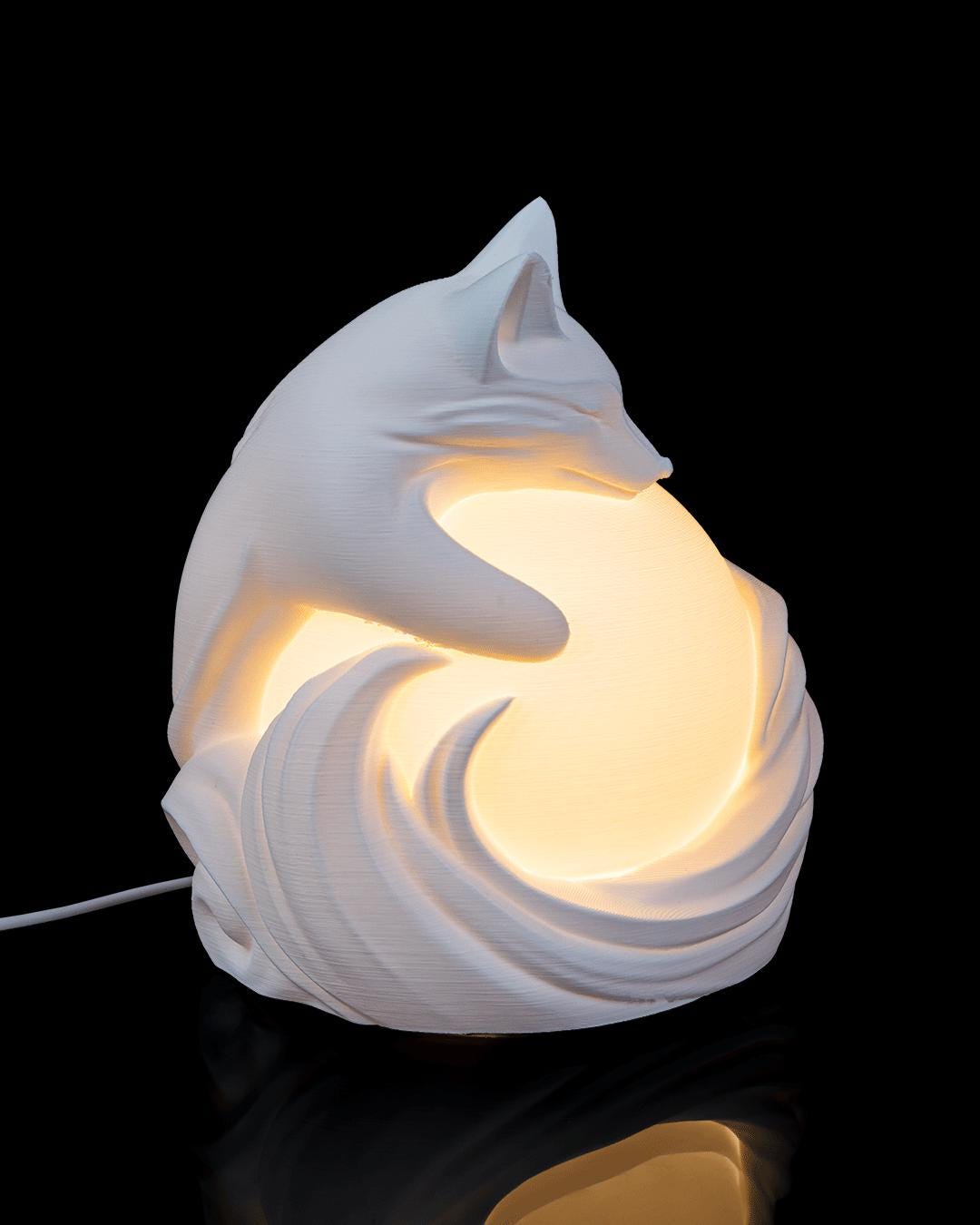 Fox sphere lamp lit, side view with power cord