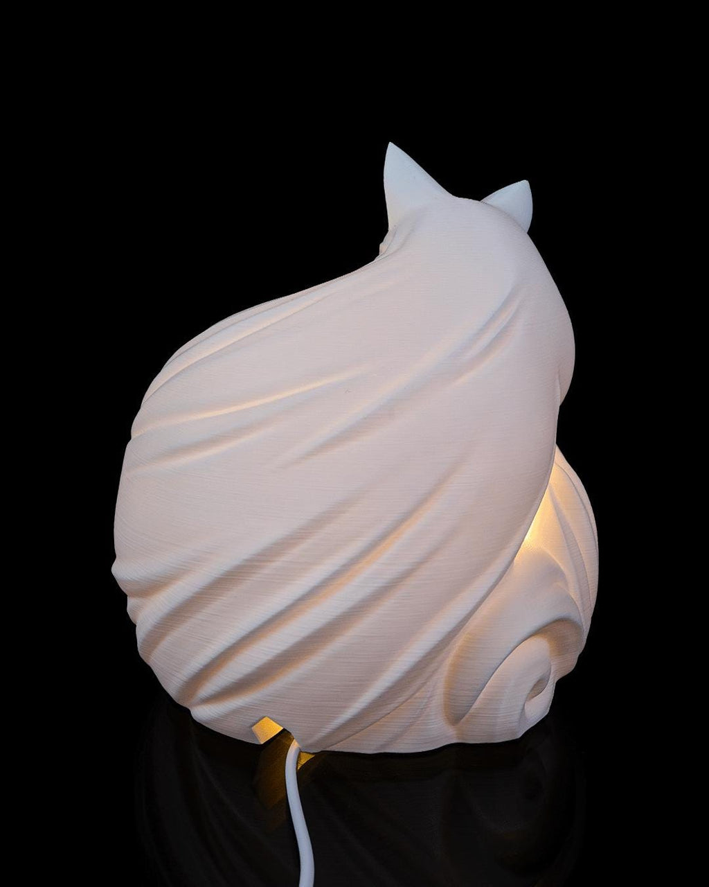 Fox sphere lamp, back view showing the swept tail