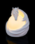 Stallion sphere lamp lit, front view of the horse head above the glowing orb