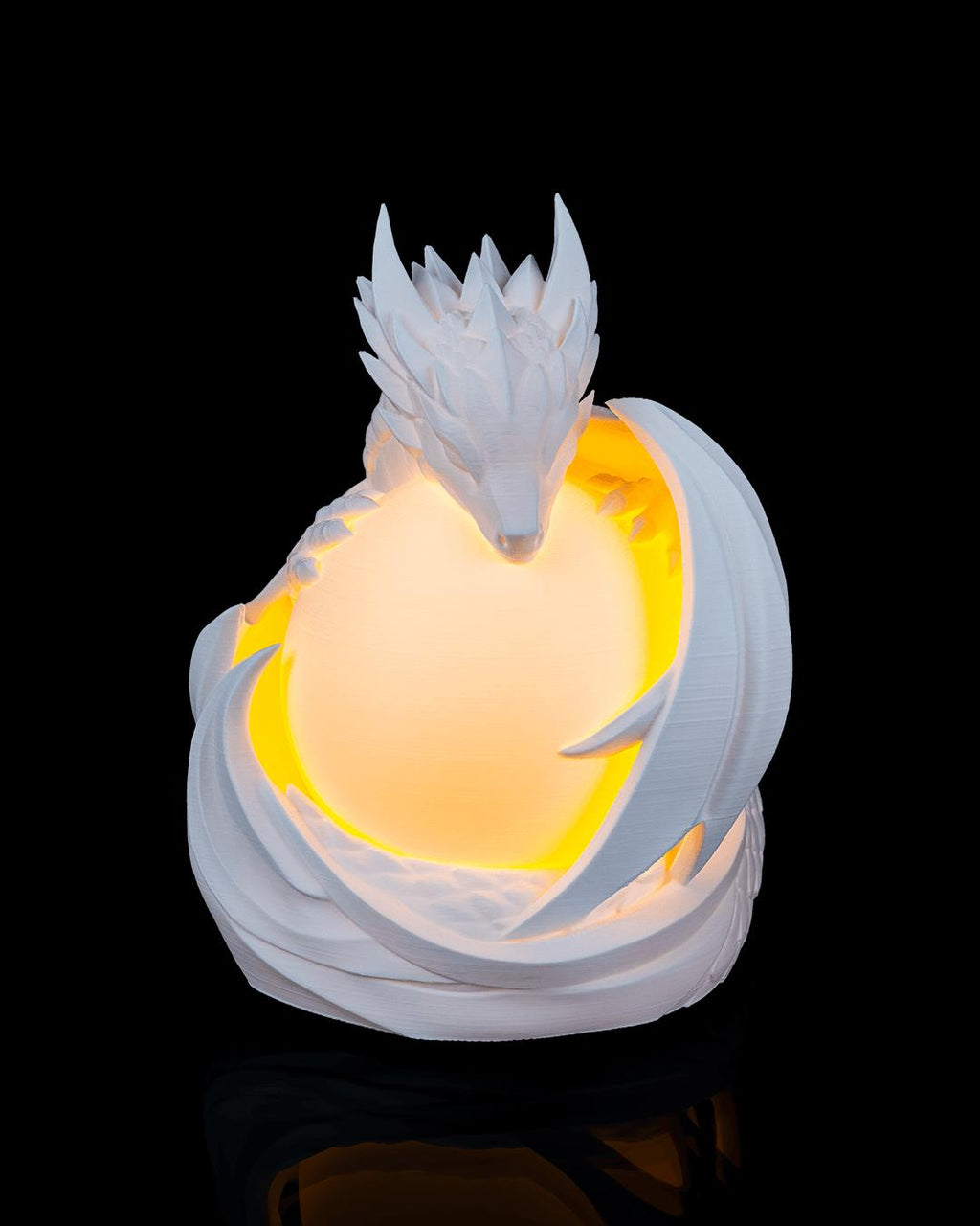 Dragon sphere lamp lit, angled front view