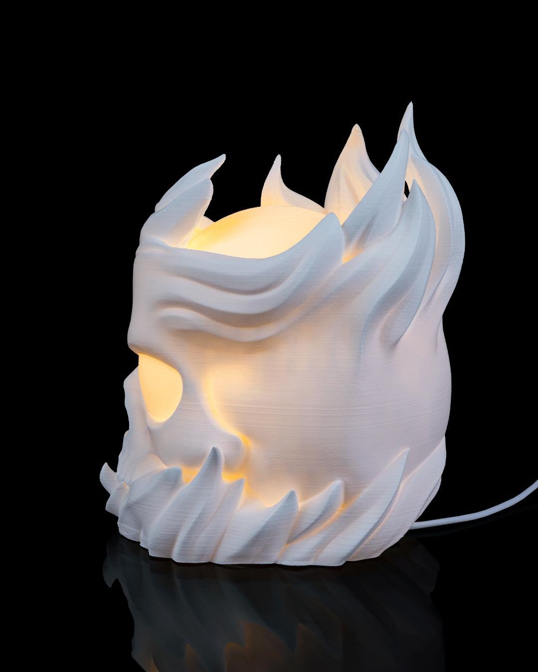 Skull sphere lamp lit, side view with power cord