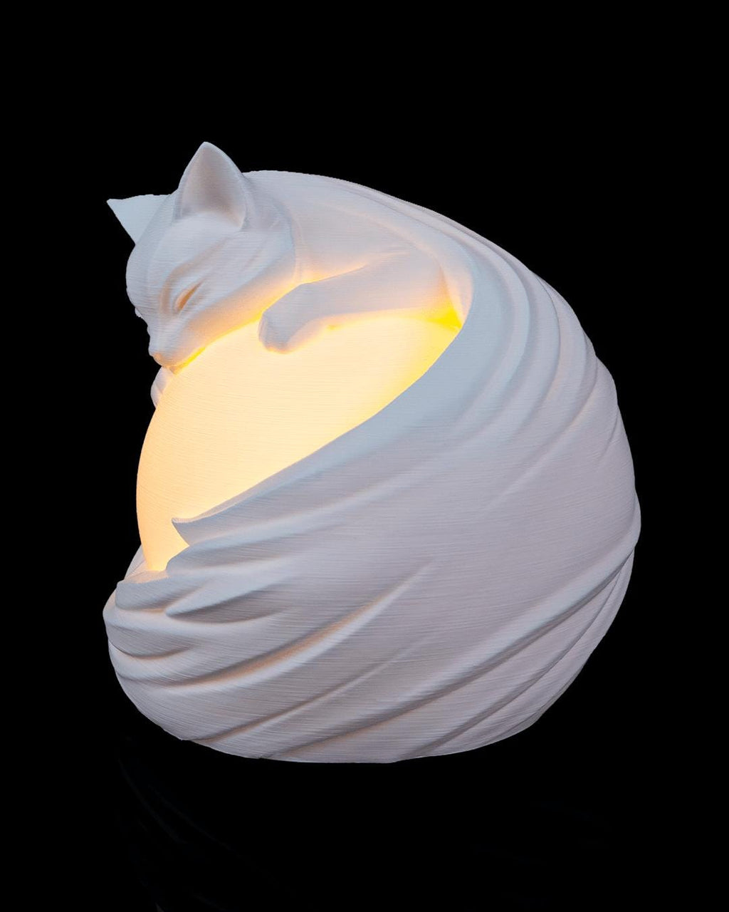 Feline sphere lamp lit, angled view