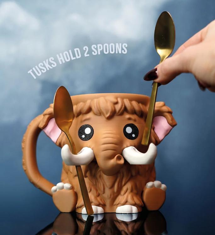 Mammuel's tusks holding two spoons