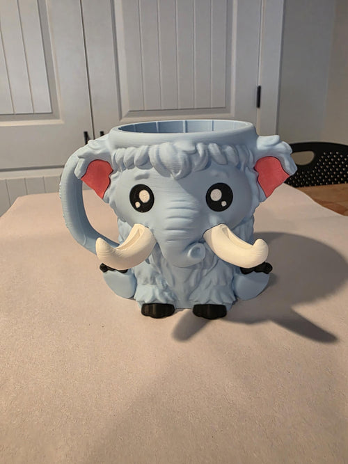 Front view of the blue-gray Mammuel the Mammoth snack holder