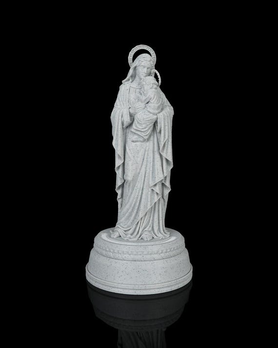 Mary holding infant Jesus religious sculpture