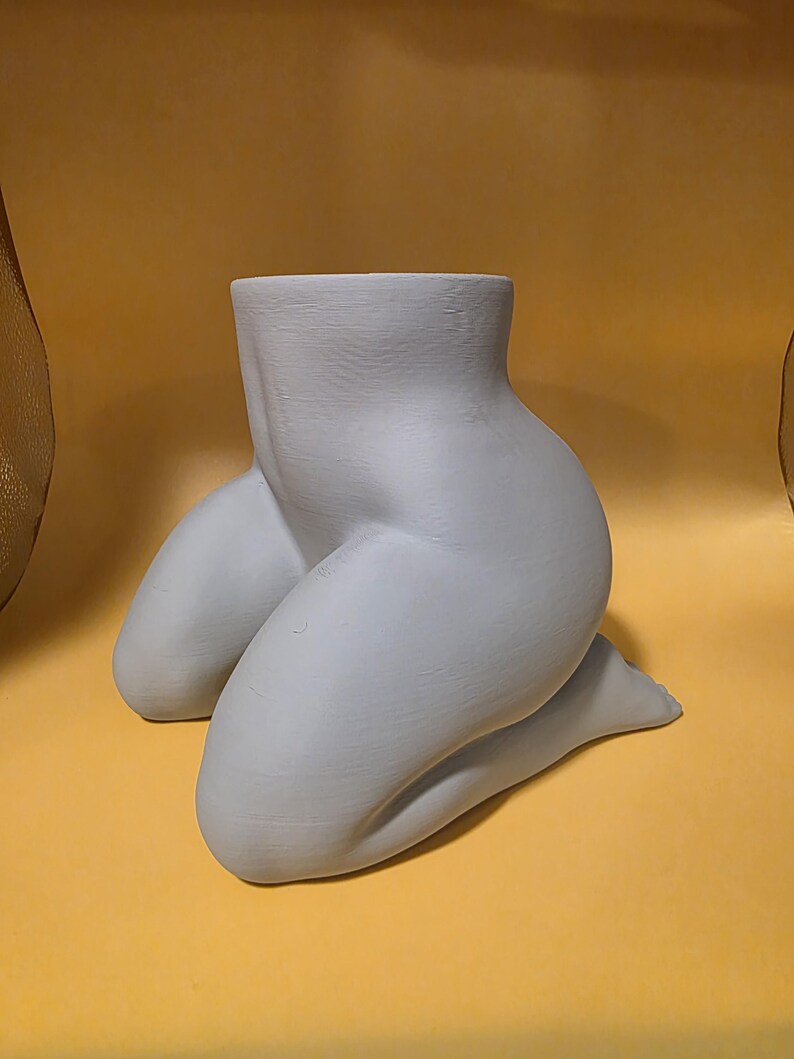 Light gray Mrs. Gray kneeling planter, side view