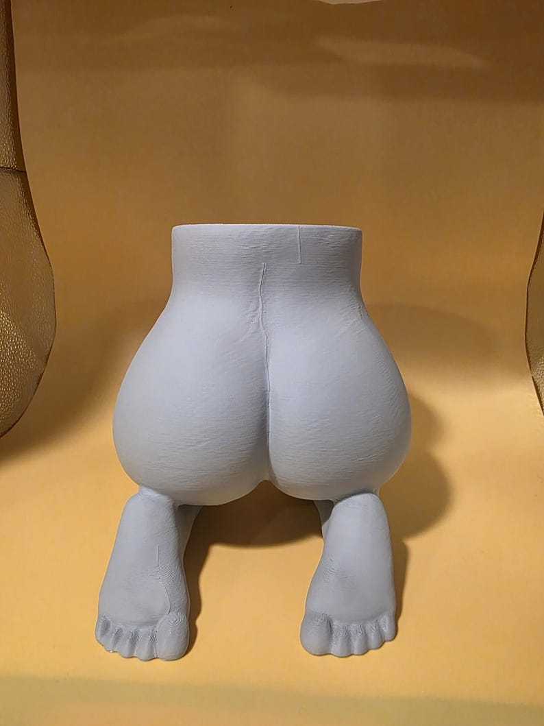 Light gray Mrs. Gray kneeling planter, rear view