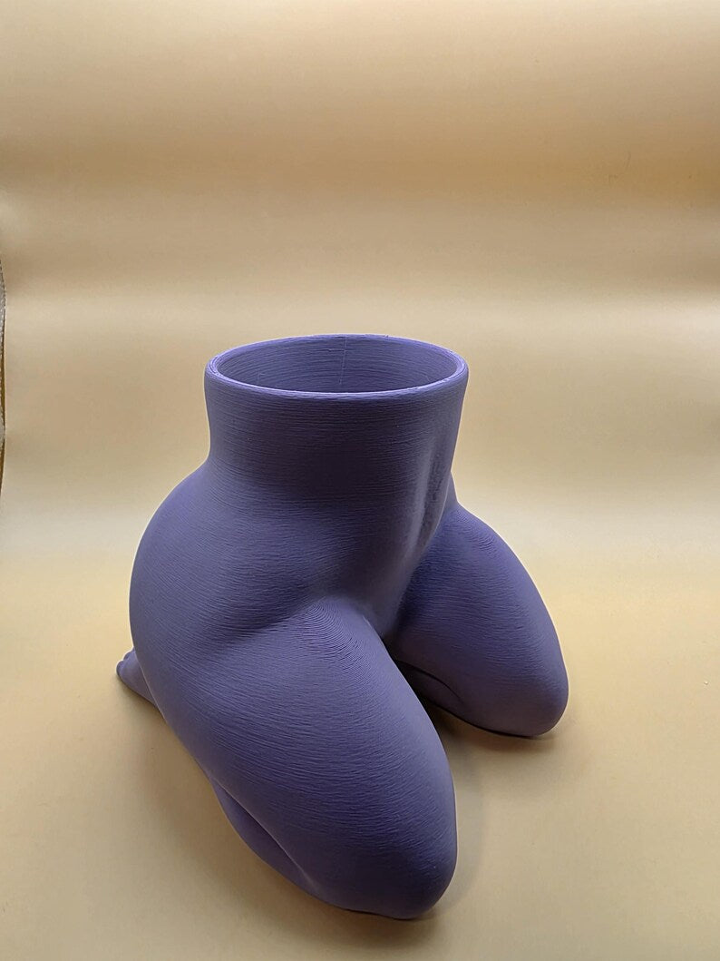 Purple Mrs. Gray kneeling planter, empty, side view