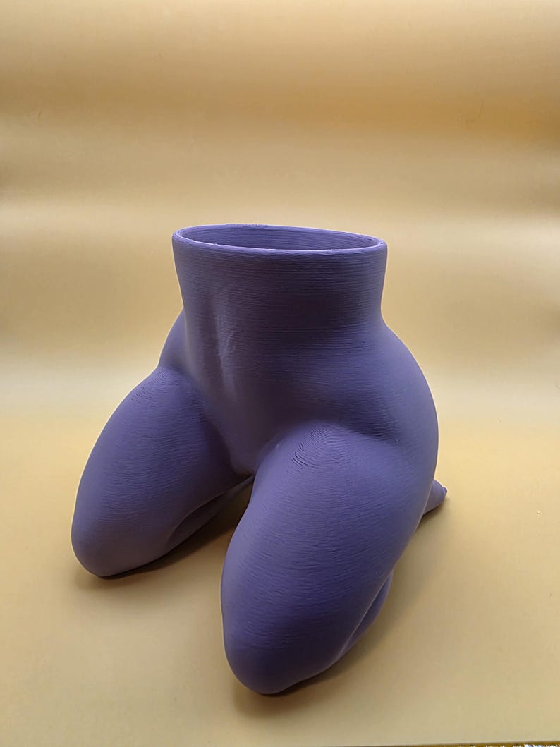 Purple Mrs. Gray kneeling planter, empty, front view
