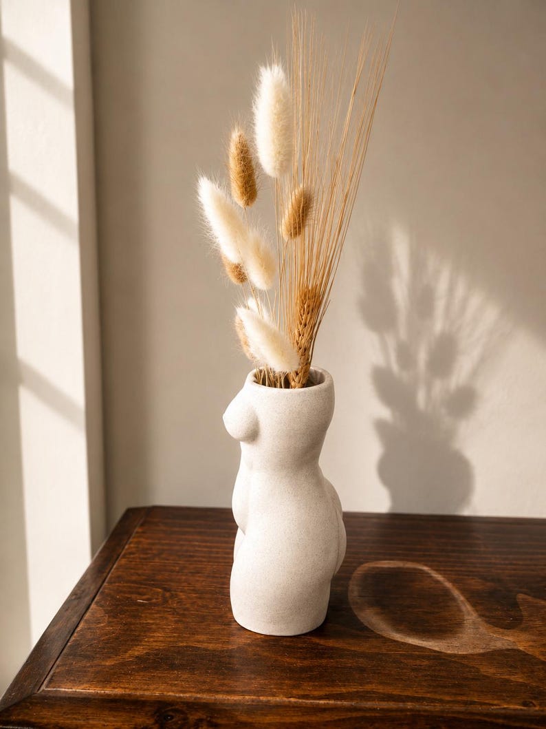 Beauty woman torso planter front view