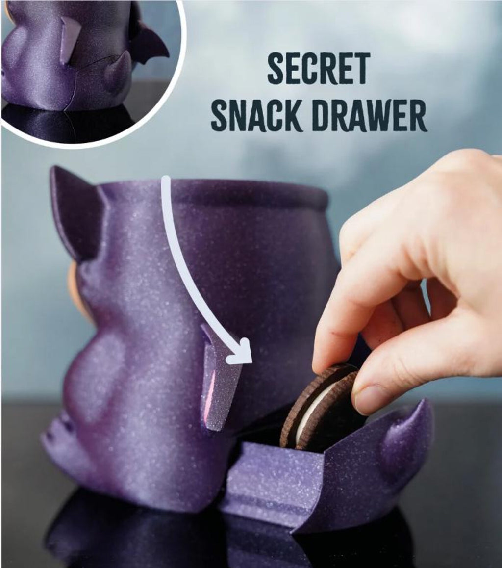 Back of purple Bramble the Bat holder with the secret snack drawer open