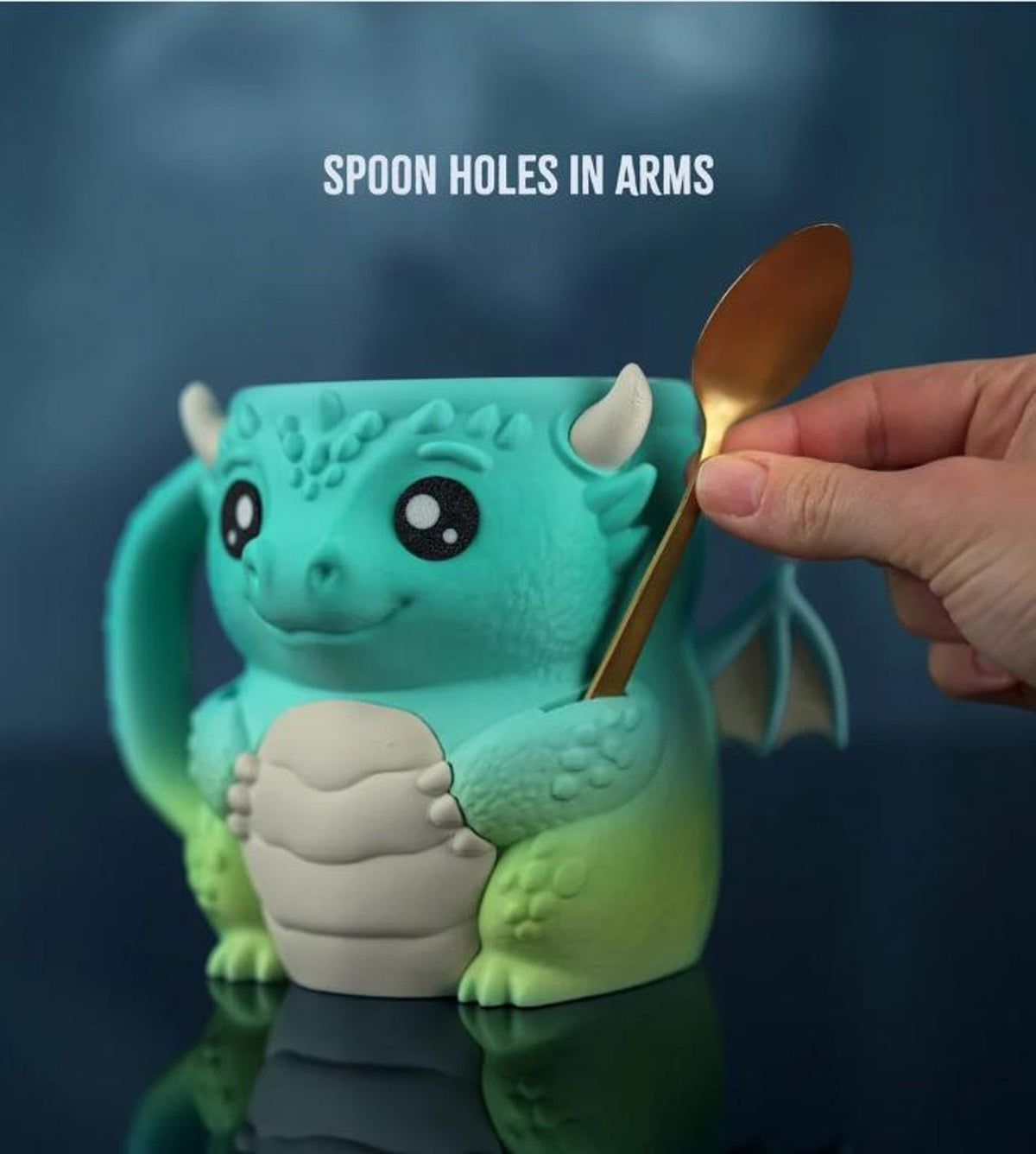 Diego the Dragon holder with a spoon resting in the arm spoon hole