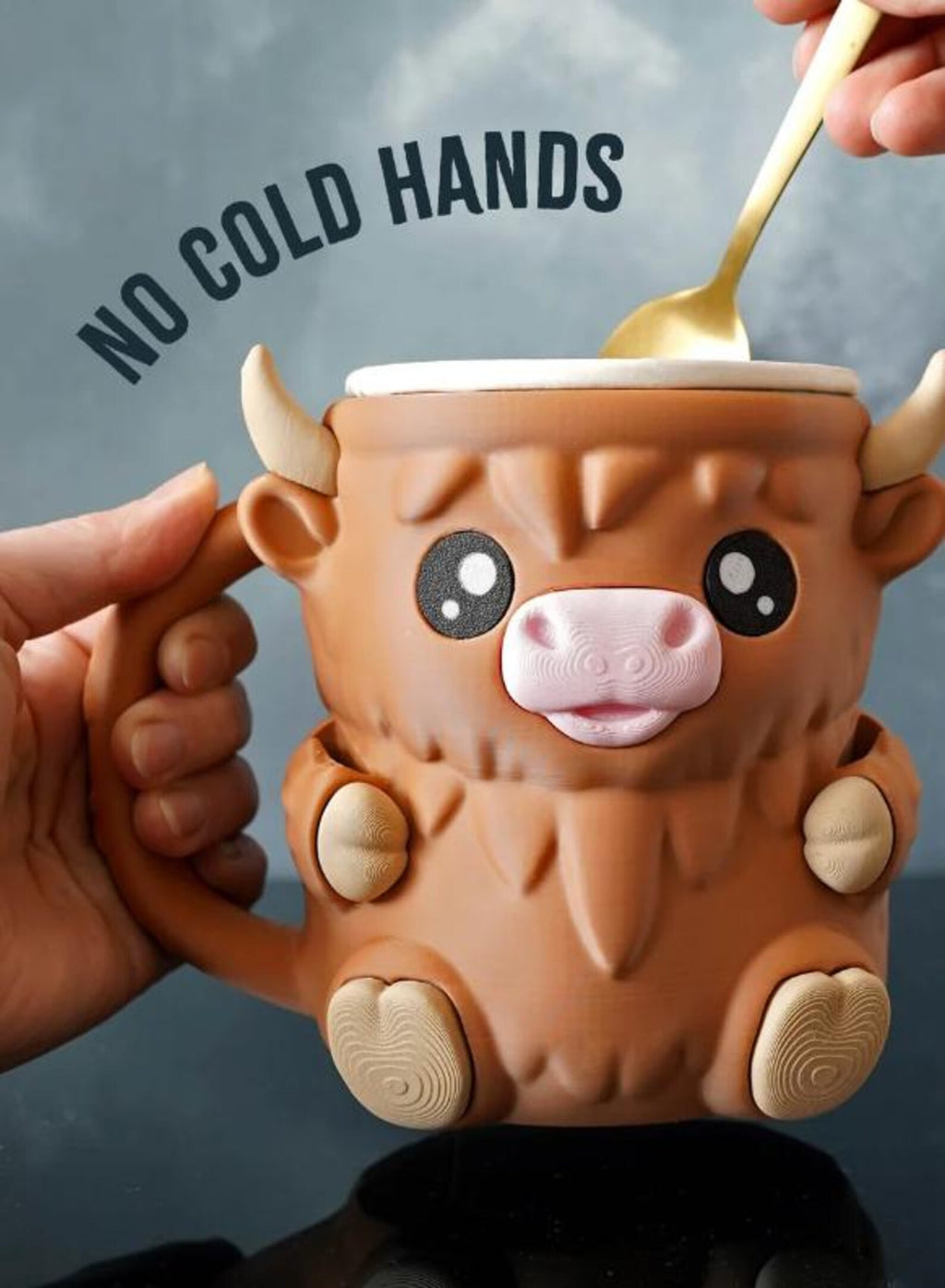 Brown Ferdinand the Highland Cow pint holder with ice cream and a spoon