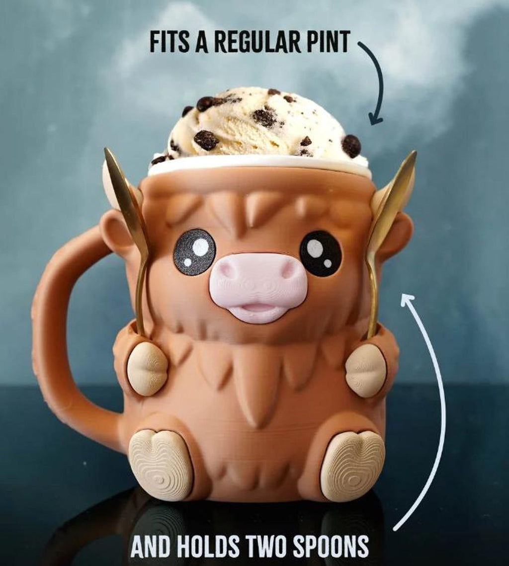 Ferdinand holding a full pint and two spoons, front view