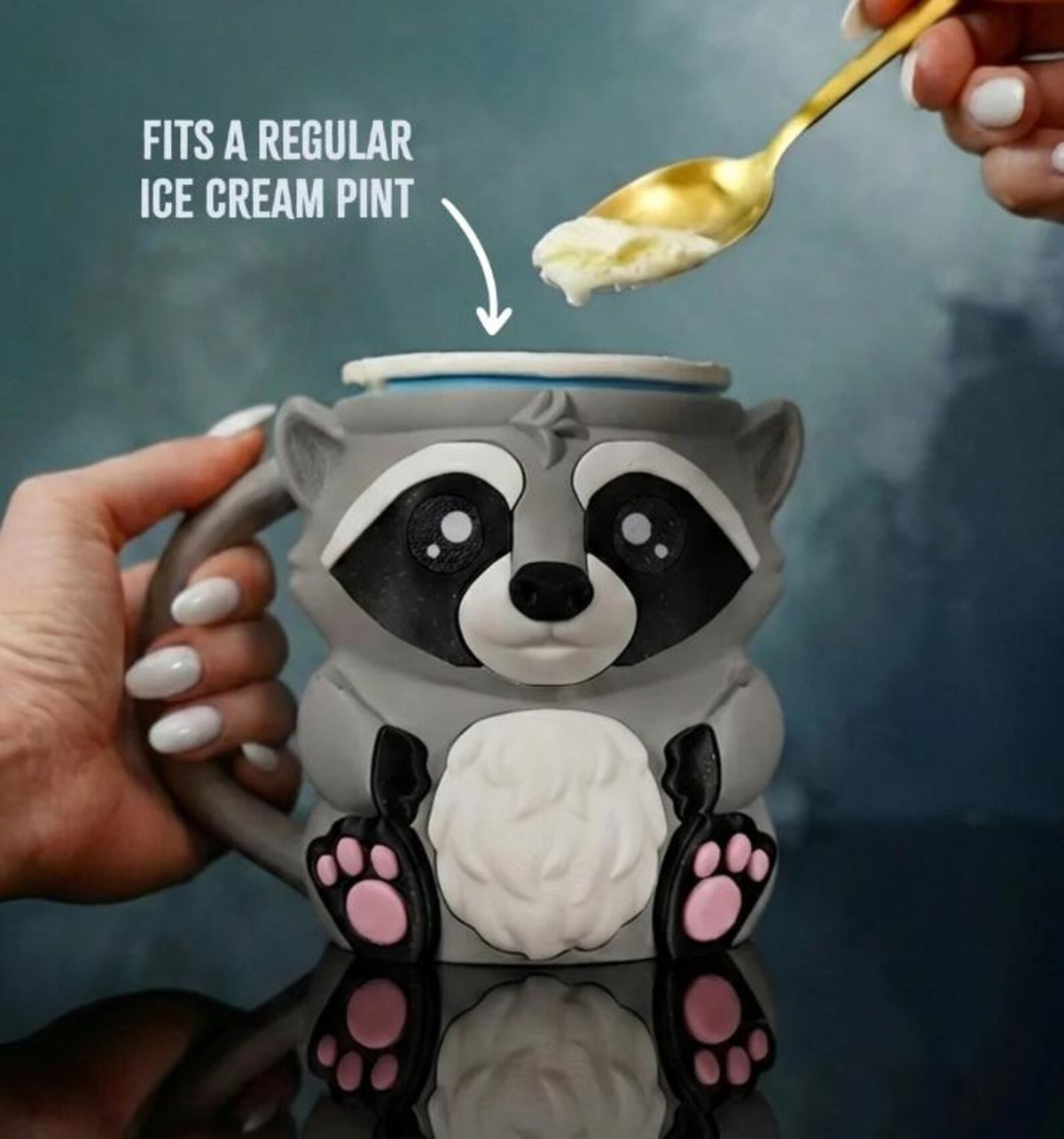 Gray Rocky the Raccoon pint holder with ice cream and a spoon