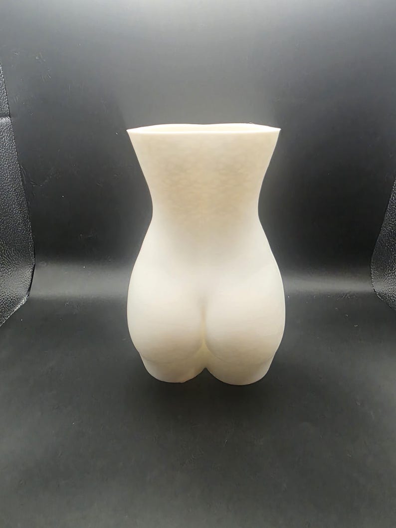Modern pregnant torso planter side view