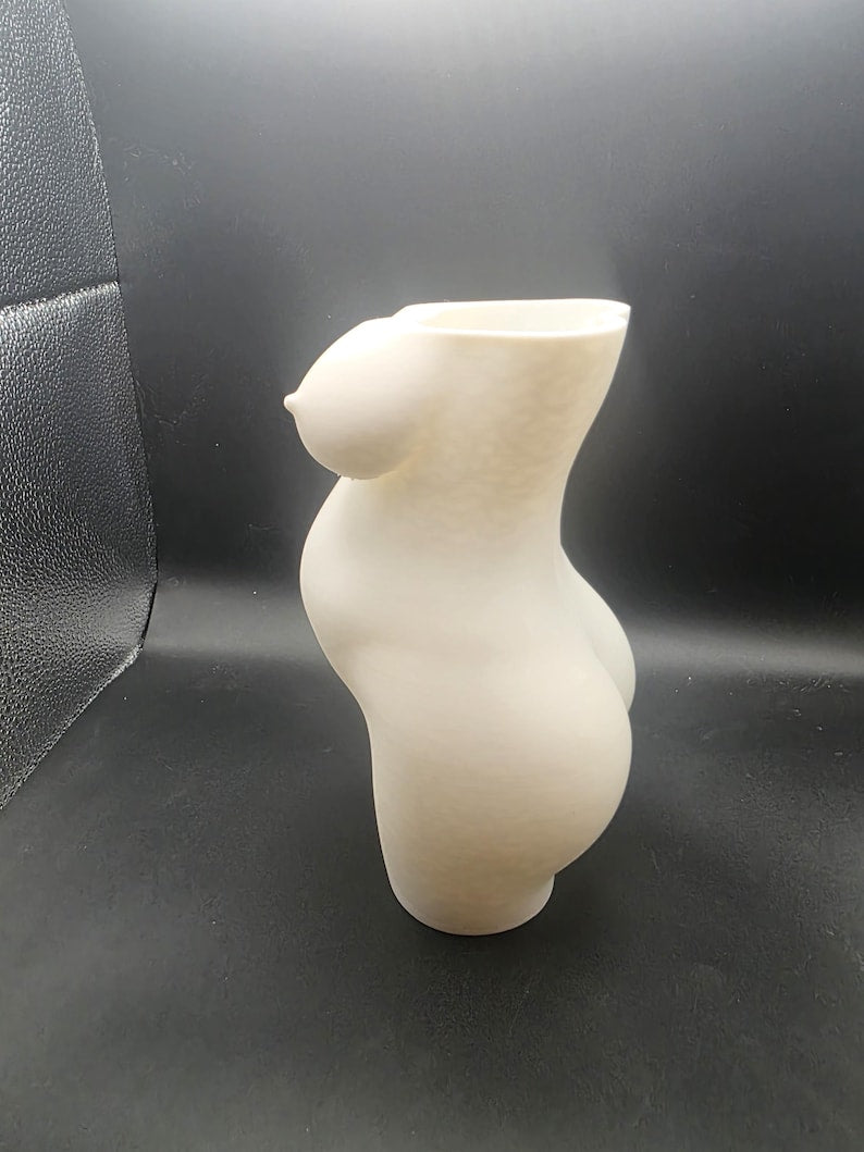 Pregnant woman sculptural vase