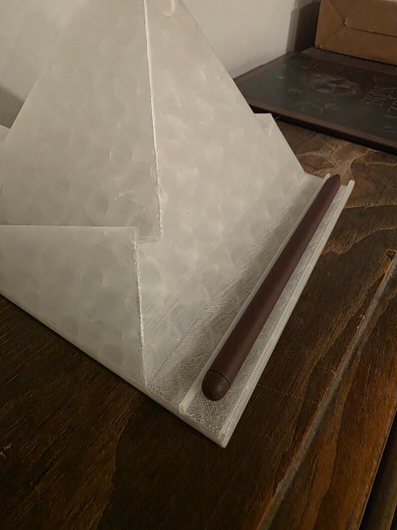 Close-up of ReadRest built-in stylus storage with a stylus