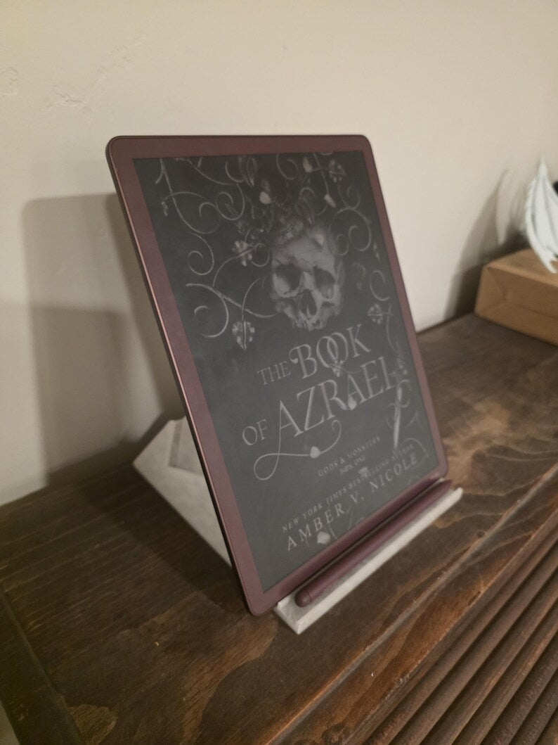 Tablet in portrait on a ReadRest stand with a stylus in the groove