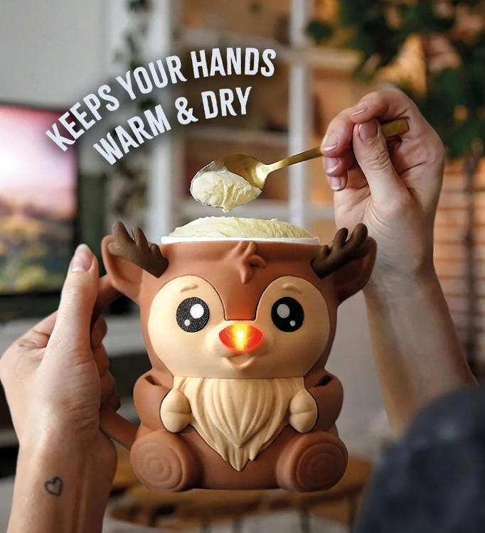 Hands holding Rudy the Reindeer with ice cream and a spoon (light-up nose not included)