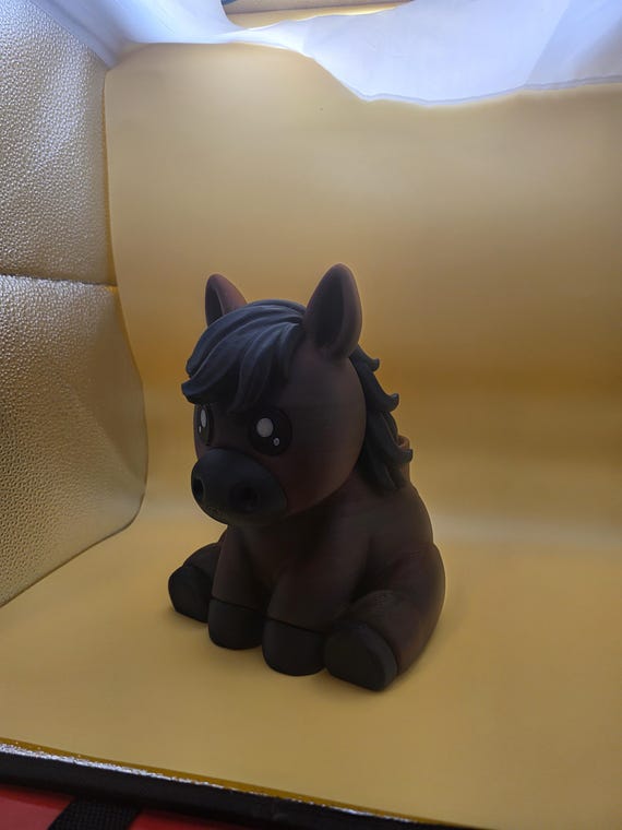 Dark brown Rylee horse desk buddy, angled view