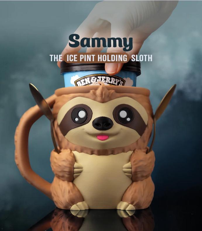 Brown Sammy the Sloth pint holder with a pint and two spoons