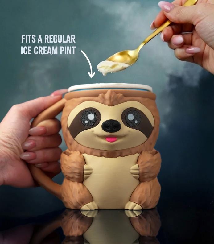 Hand holding Sammy the Sloth holder filled with ice cream