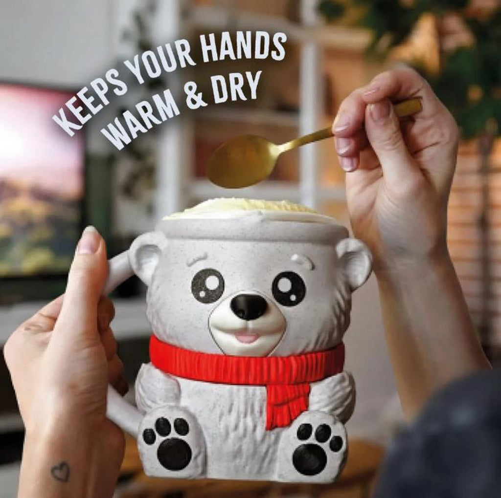 Hands holding the white bear pint holder with red scarf and a spoon
