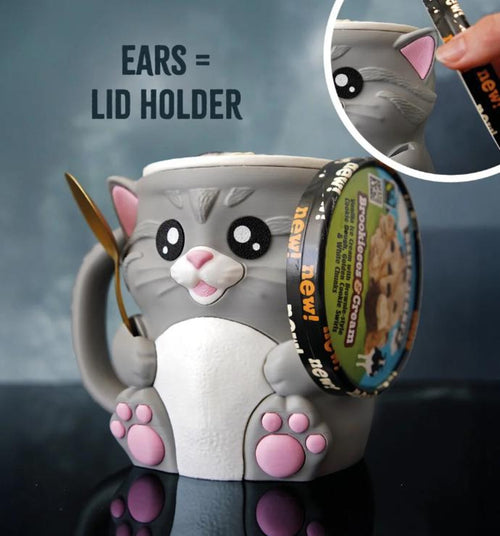 Cuddles the Cat pint holder with the pint lid stored in its ears