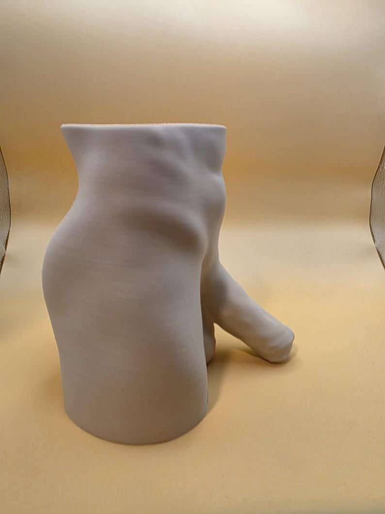 Light gray Uncircumcised Monster Dong planter, side view