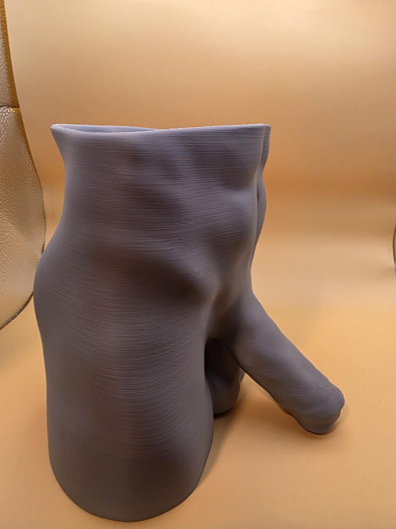 Gray Uncircumcised Monster Dong planter, side view